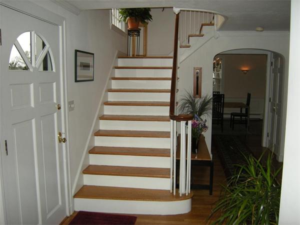 259 Varick Road Newton, MA 02468 - Photo 18 of 28 a view of entryway and hall with wooden floor
