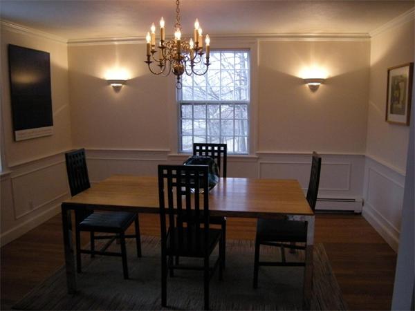 259 Varick Road Newton, MA 02468 - Photo 4 of 28 a view of a dining room with furniture and chandelier