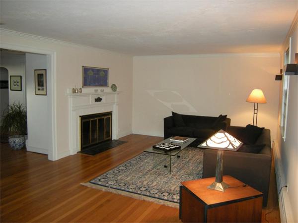 259 Varick Road Newton, MA 02468 - Photo 8 of 28 a room with furniture and wooden floor