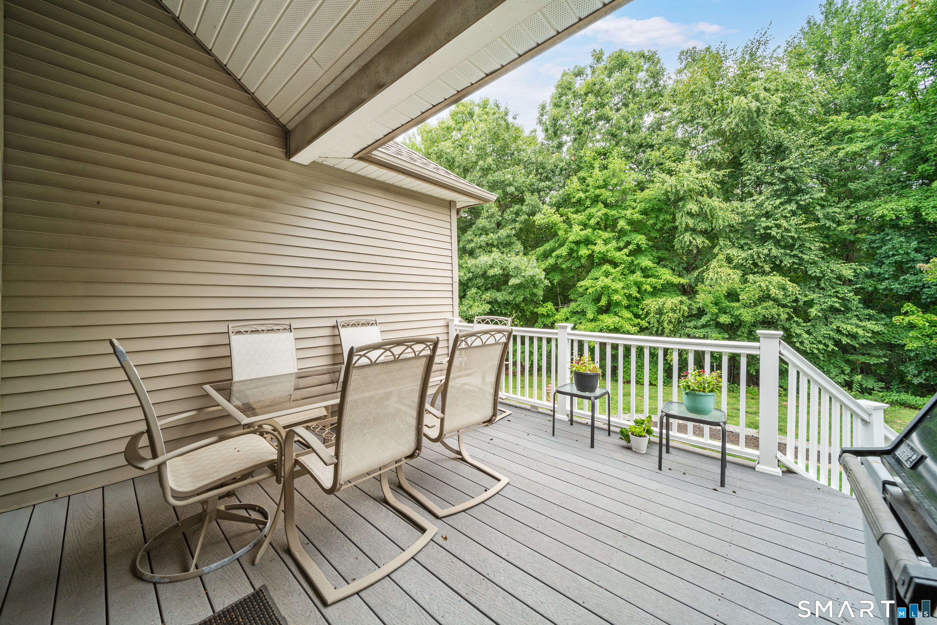 29 Arvida Road Wolcott, CT 06716 - Photo 32 of 38 Main level deck off of living room