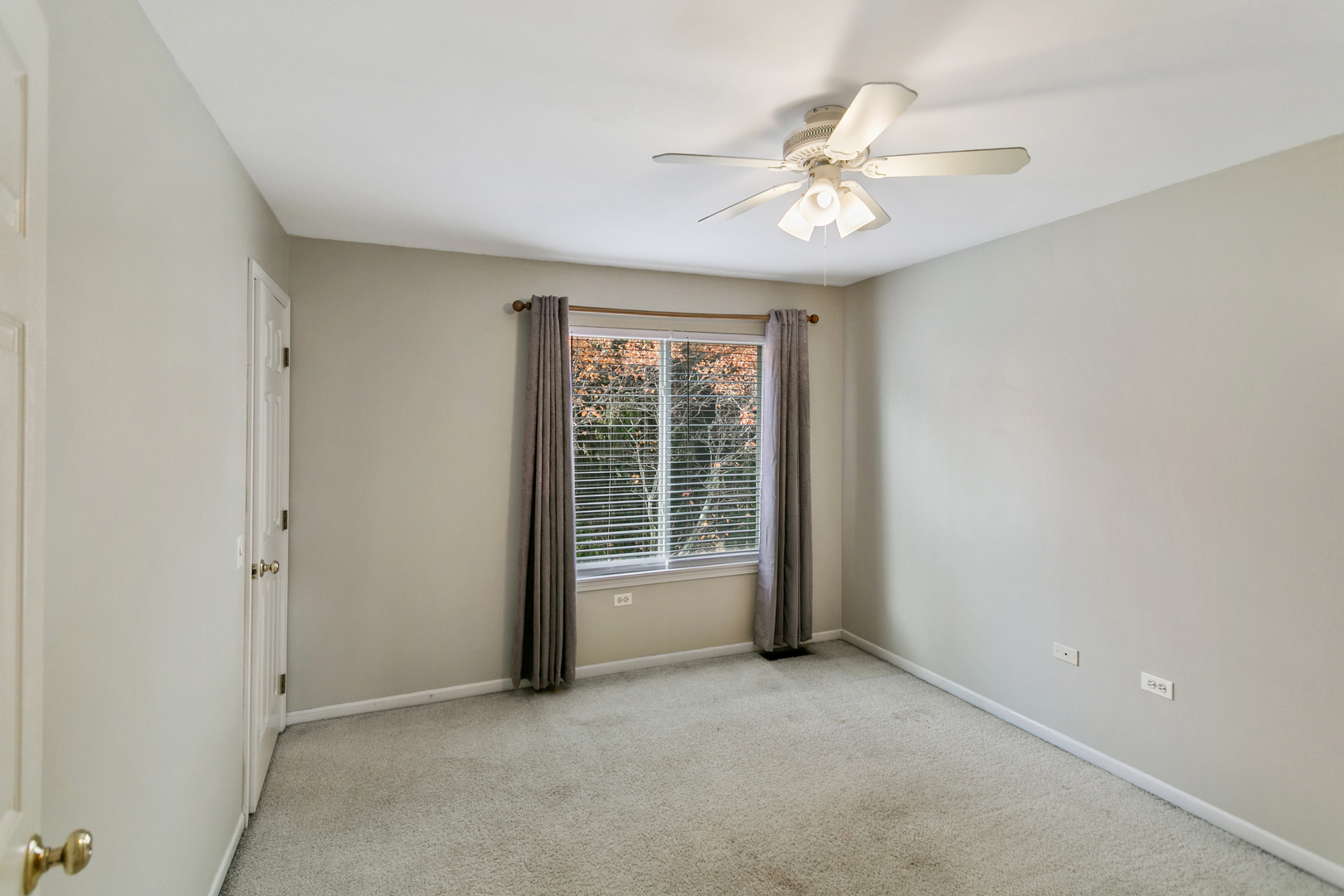67 Raven Drive Aurora, IL 60506 - Photo 20 of 30 a view of an empty room with a window