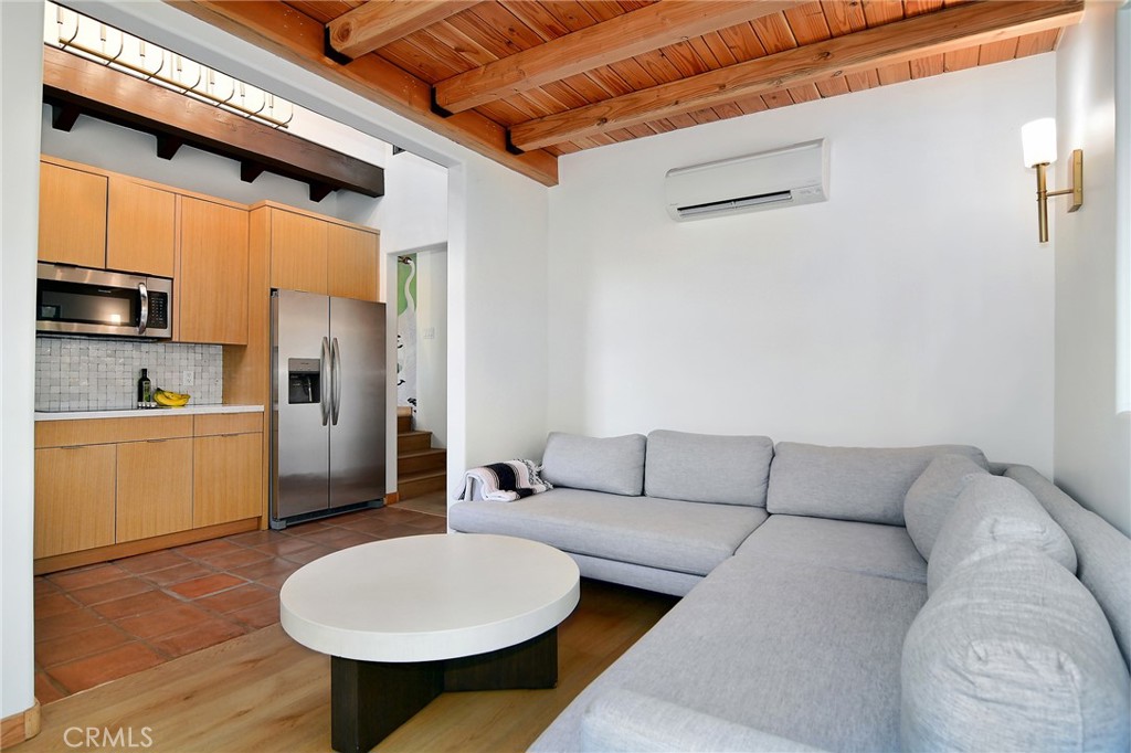 31350 Lobo Canyon Road Agoura Hills, CA 91301 - Photo 17 of 24 a living room with furniture and a kitchen