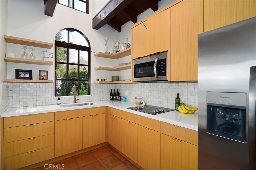 31350 Lobo Canyon Road Agoura Hills, CA 91301 - Photo 19 of 24 a kitchen with a sink cabinets and window