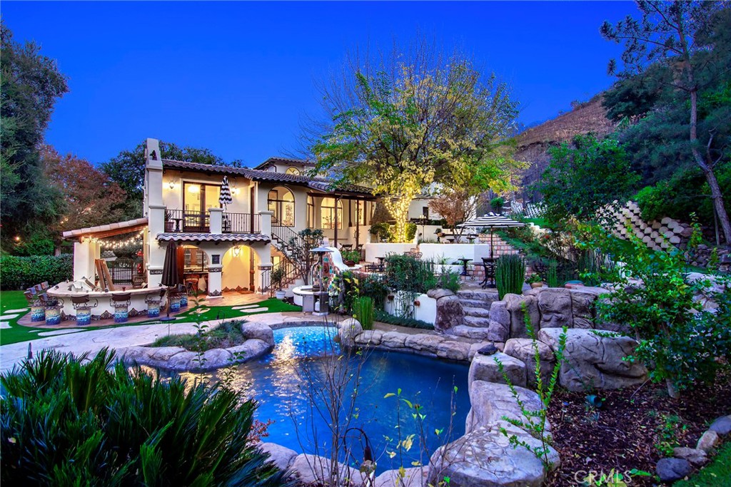 31350 Lobo Canyon Road Agoura Hills, CA 91301 - Photo 2 of 24 a view of a house with a yard balcony and sitting area