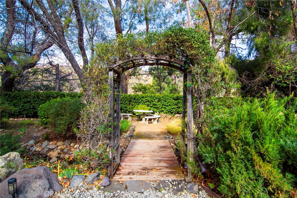 31350 Lobo Canyon Road Agoura Hills, CA 91301 - Photo 22 of 24 a view of a pathway both side of yard