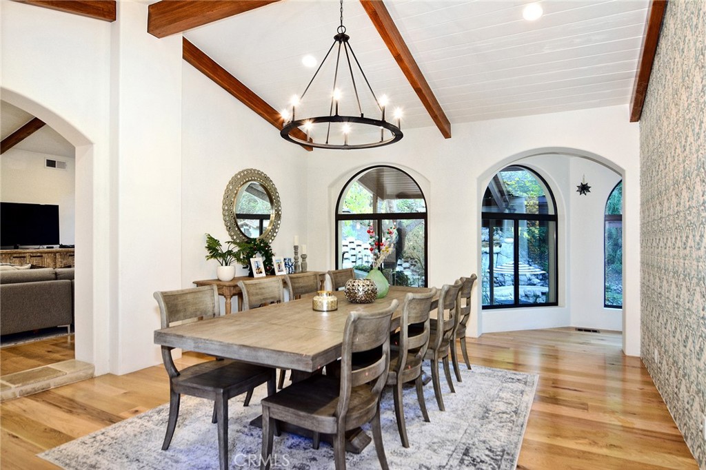 31350 Lobo Canyon Road Agoura Hills, CA 91301 - Photo 5 of 24 a dining room with furniture a rug and wooden floor