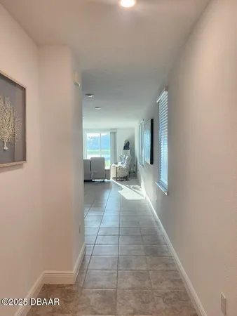 a view of a bedroom with a bed and couch