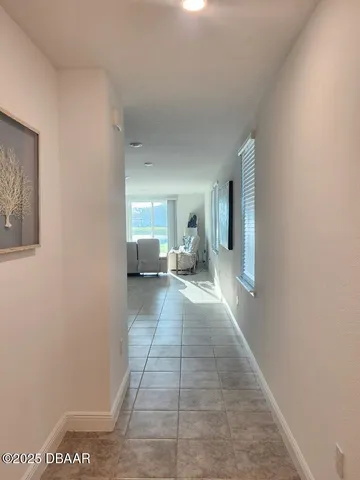 a view of a bedroom with a bed and couch