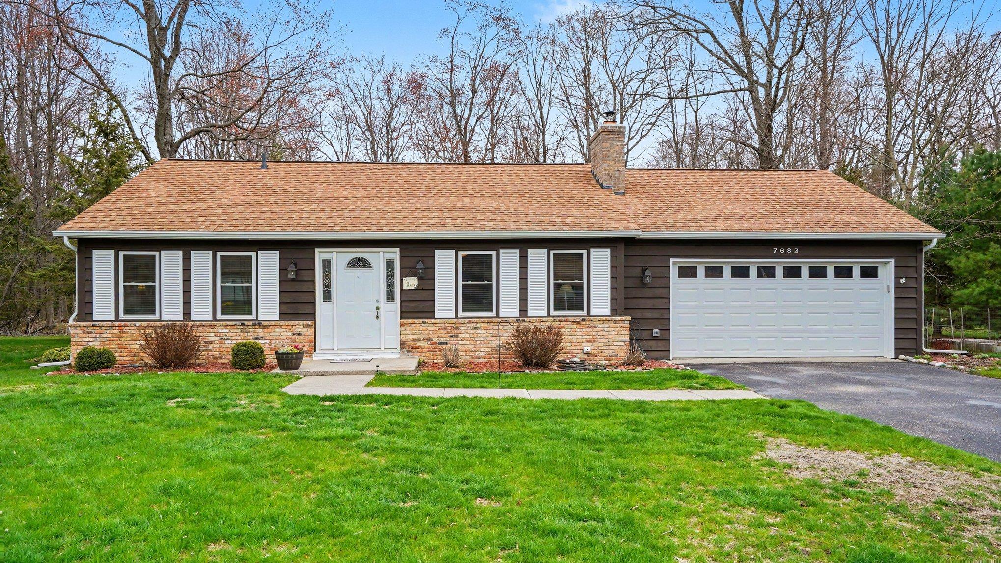 7682 Woodlea Road West Oscoda, MI 48750 - Photo 2 of 26