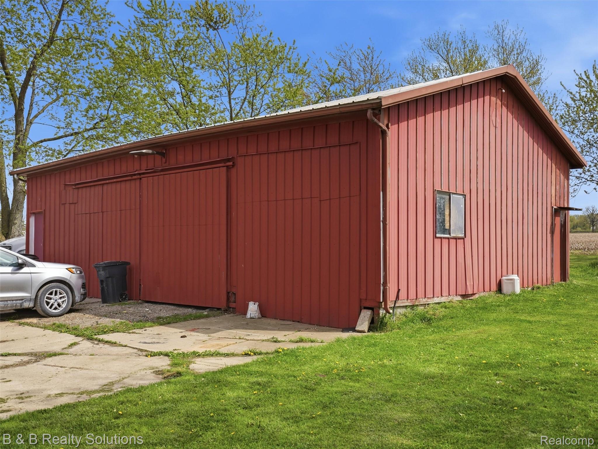 21900 Bordman Road Armada, MI 48005 - Photo 48 of 55 View of pole building featuring a lawn
