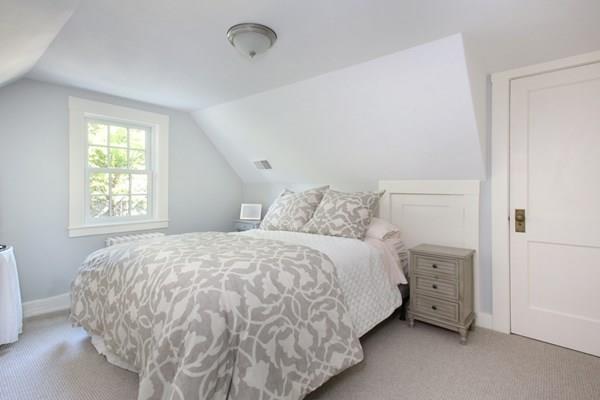 76 Alban Road Newton, MA 02468 - Photo 14 of 19 a bedroom with a bed and a window