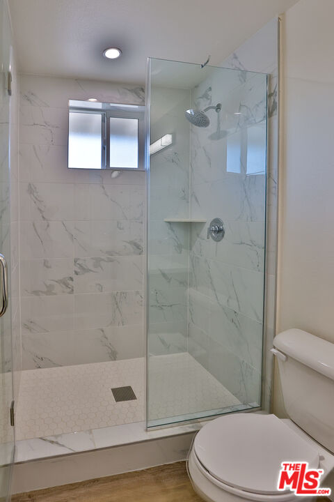 1237 West 25th Street, Unit 1241 1/2 Los Angeles, CA 90007 - Photo 15 of 16 a bathroom with a toilet and a shower