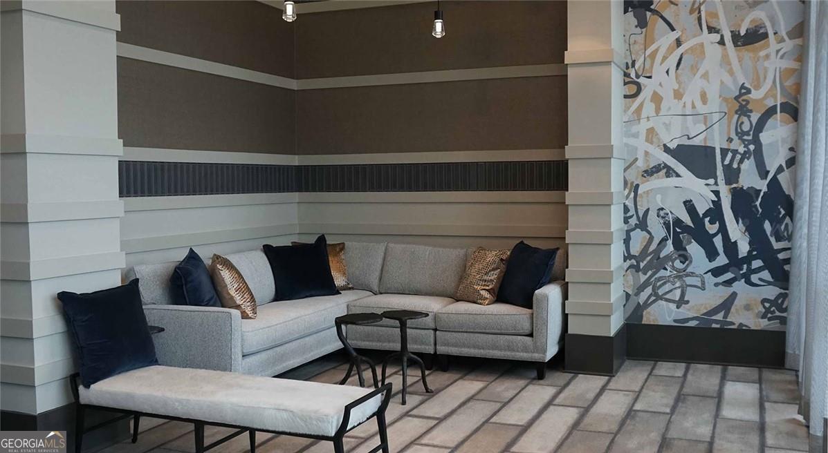 1486 Terrell Mill Road Southeast, Unit 449 Marietta, GA 30067 - Photo 11 of 25 a living room with furniture and a rug