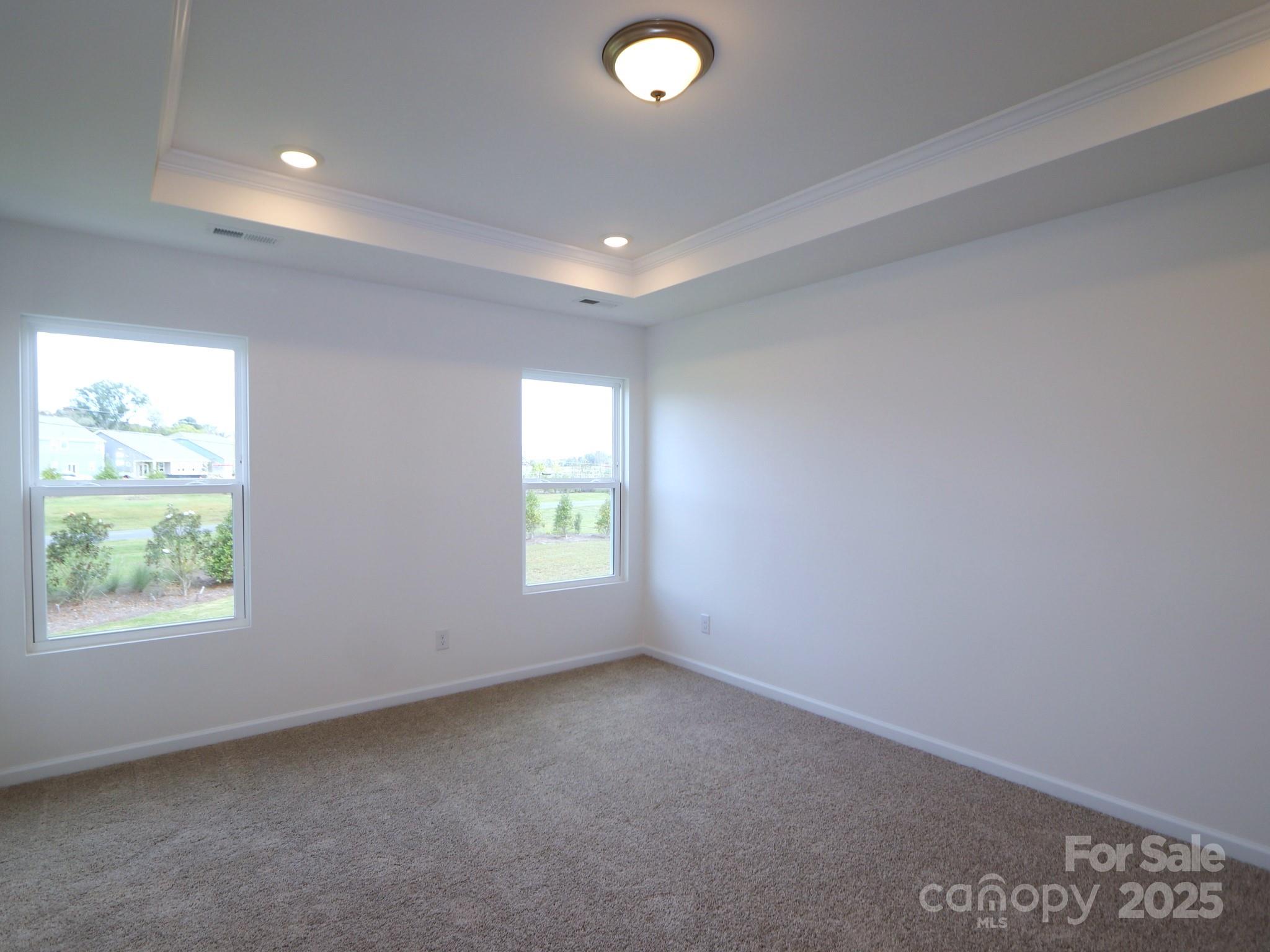 1008 Overbrook Place Wingate, NC 28174 - Photo 14 of 18 an empty room with windows