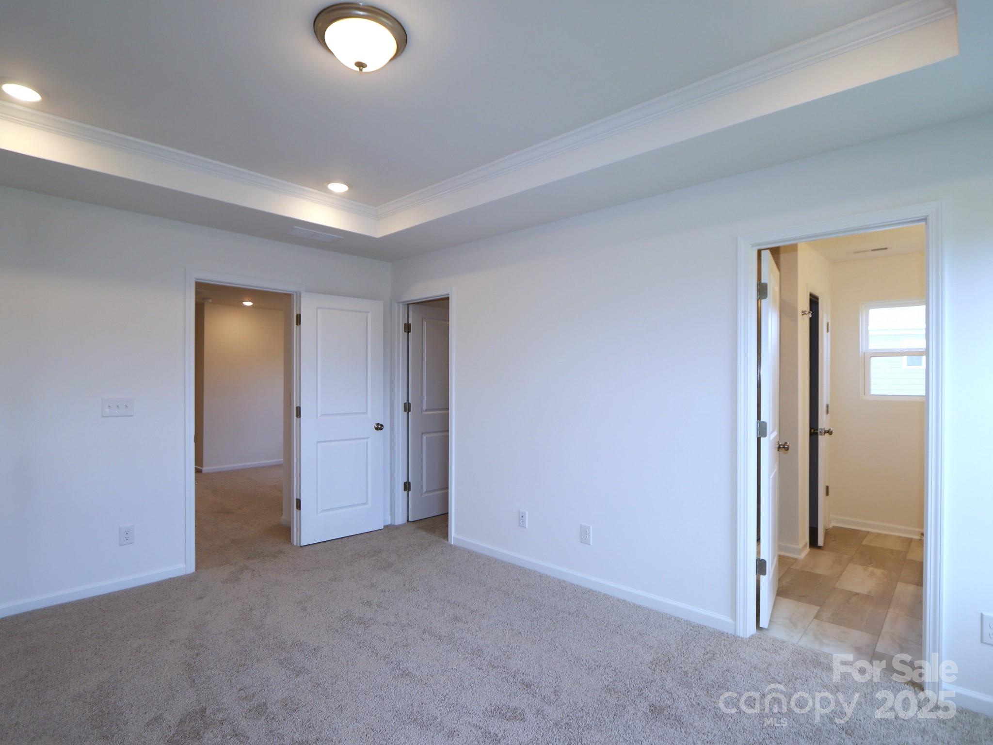 1008 Overbrook Place Wingate, NC 28174 - Photo 17 of 18 an empty room with closet and a bathroom