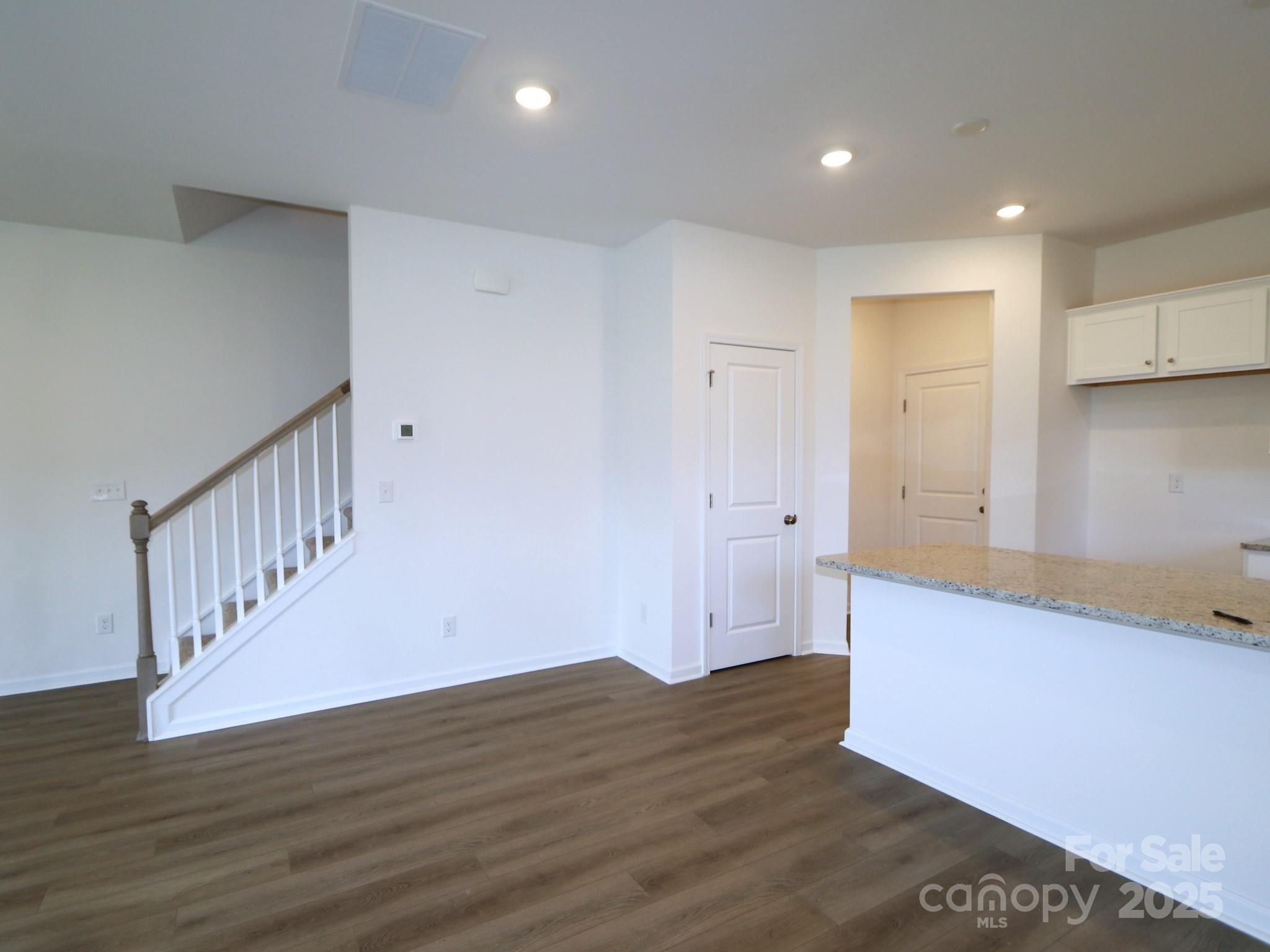 1008 Overbrook Place Wingate, NC 28174 - Photo 6 of 18 a view of hallway with wooden floor