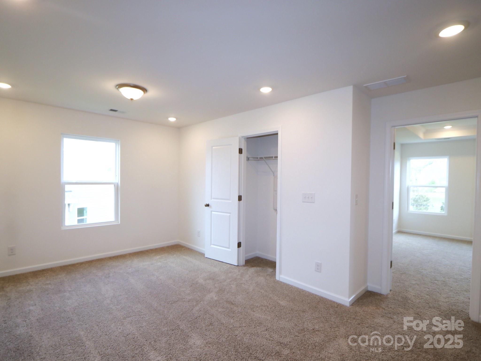 1008 Overbrook Place Wingate, NC 28174 - Photo 9 of 18 a view of an empty room with a window