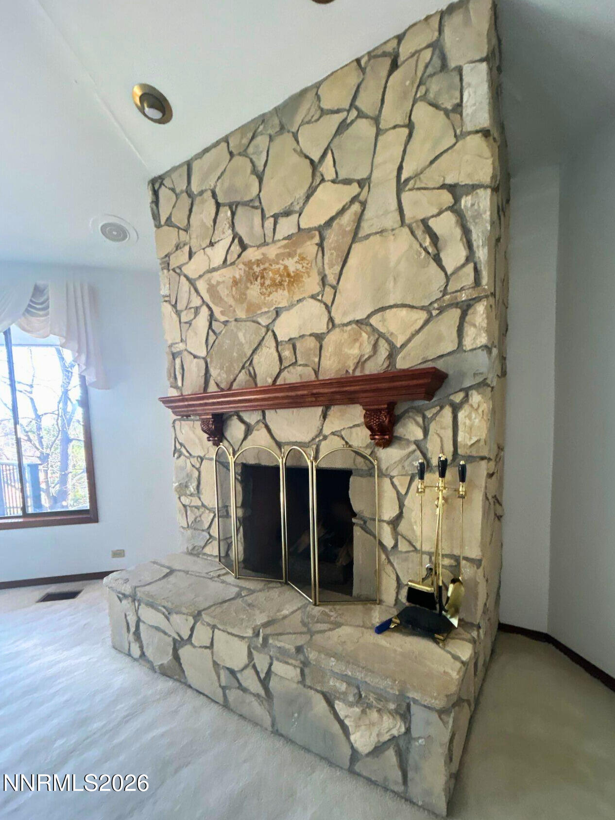 2795 West Lake Ridge Reno, NV 89519 - Photo 12 of 31 a bedroom with a bed and a window