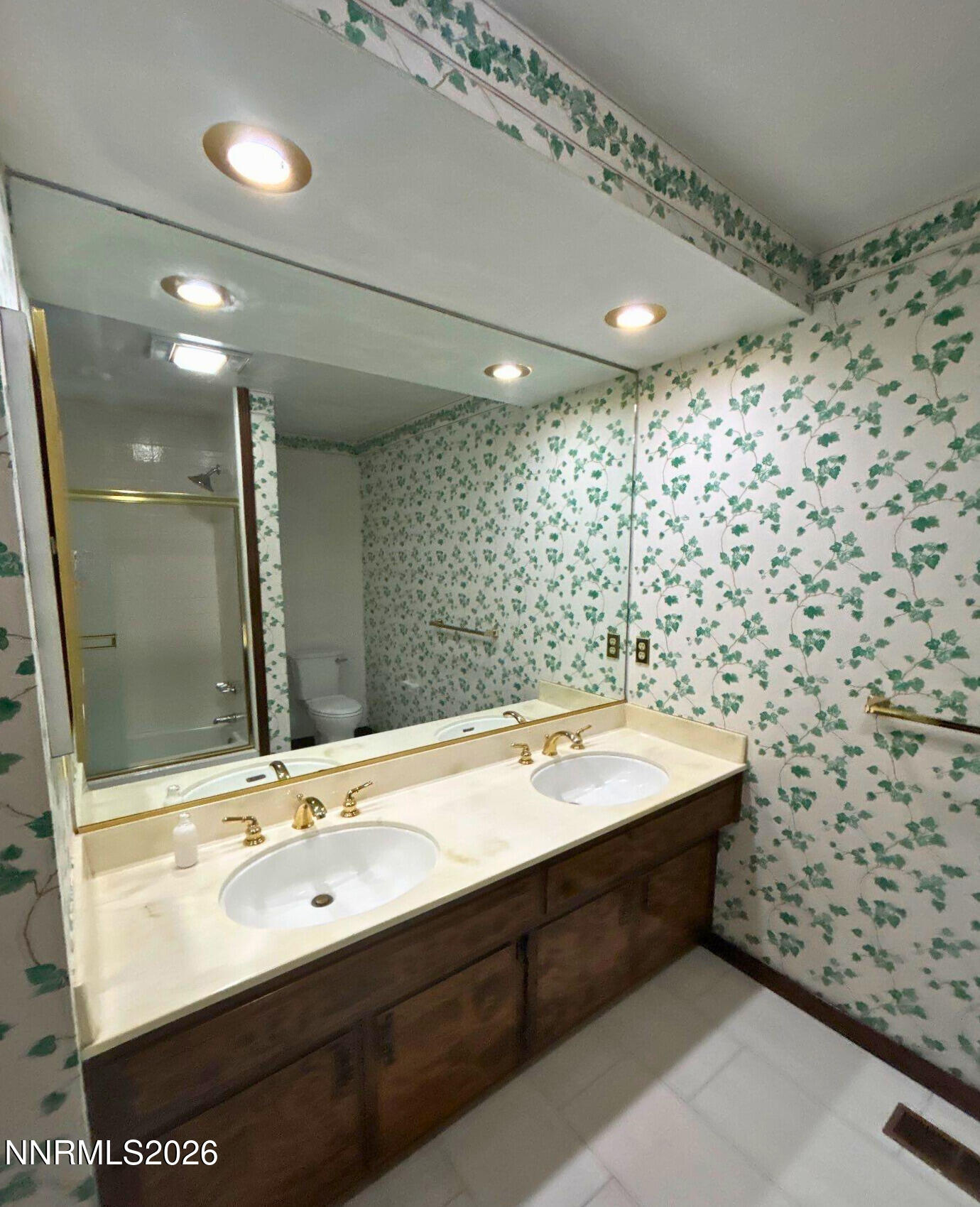 2795 West Lake Ridge Reno, NV 89519 - Photo 21 of 31 a bathroom with a double vanity sink mirror and shower