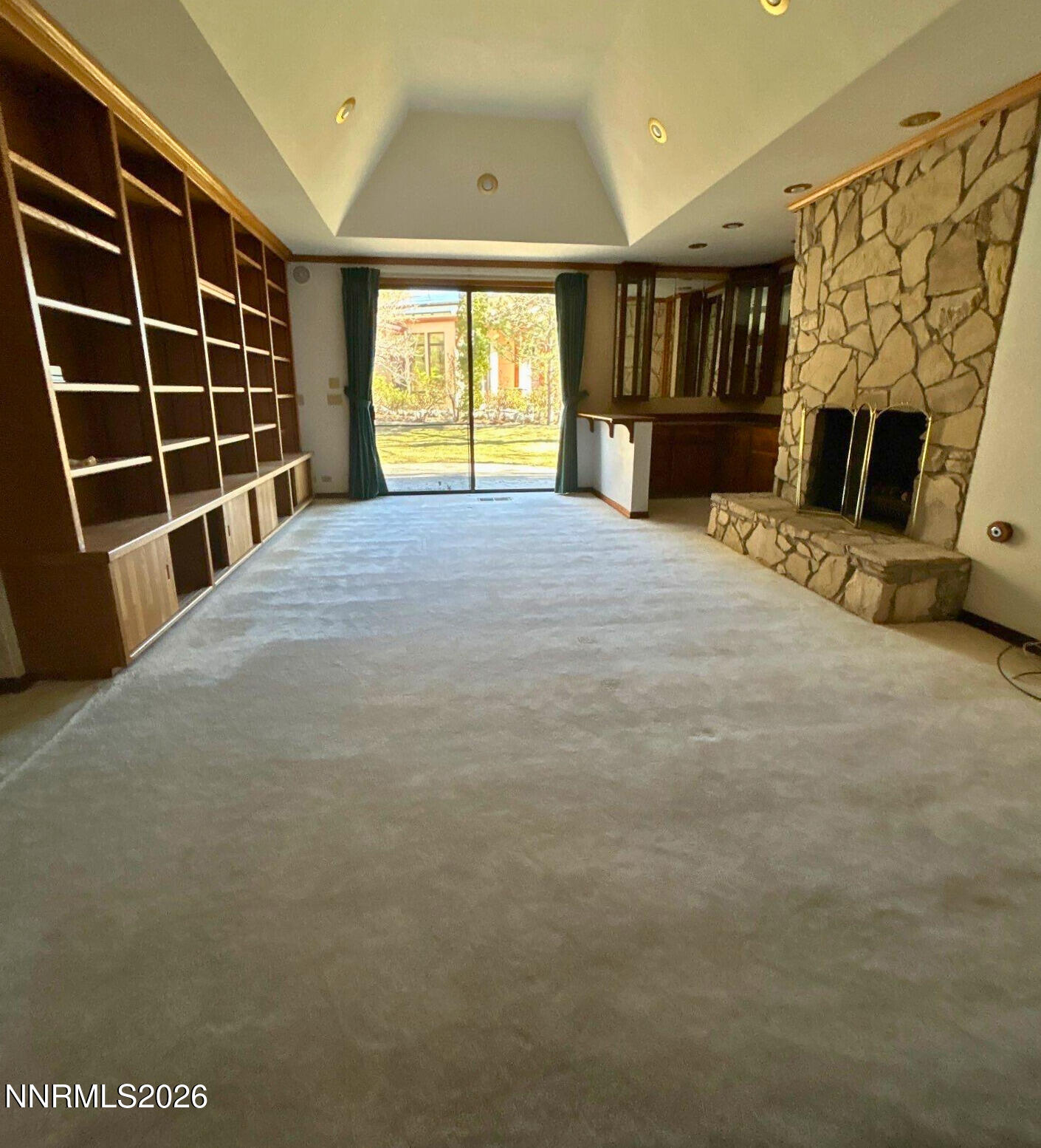 2795 West Lake Ridge Reno, NV 89519 - Photo 22 of 31 a view of empty room with a fireplace and windows