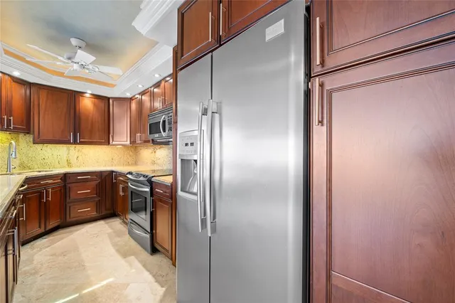 a living room with furniture fireplace and flat screen tv