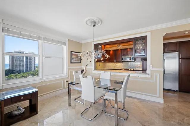 a living room with furniture a rug and a flat screen tv