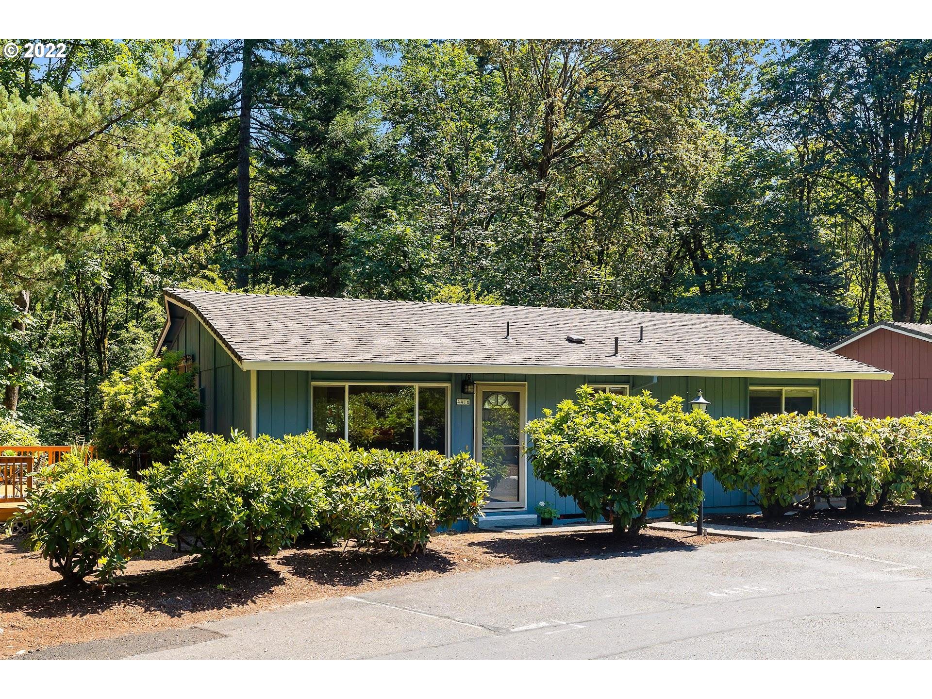 4416 Northwest Barnes Road Portland, OR 97210 - Photo 20 of 23 a house view with a garden space