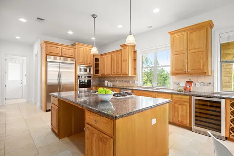 $1,225,000 | 19 Swiftwater Trail, The Hills, TX 78738