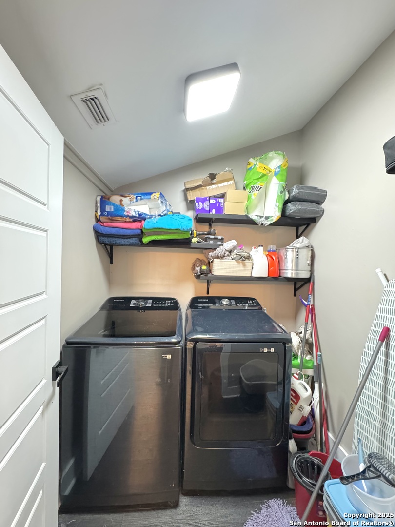 1106 North High Street Uvalde, TX 78801 - Photo 17 of 26 a utility room with dryer and washer