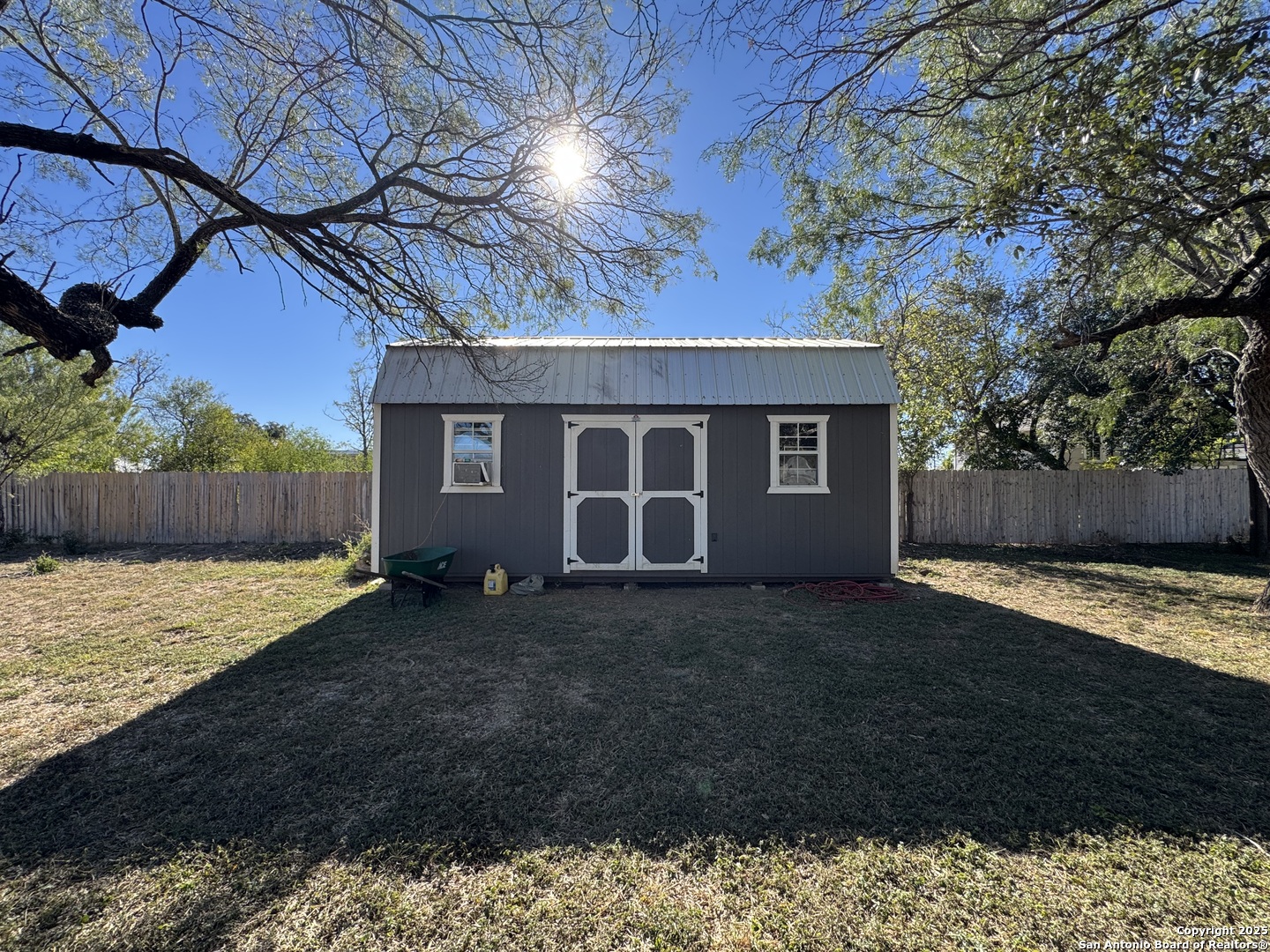 1106 North High Street Uvalde, TX 78801 - Photo 24 of 26 a view of a house with a yard