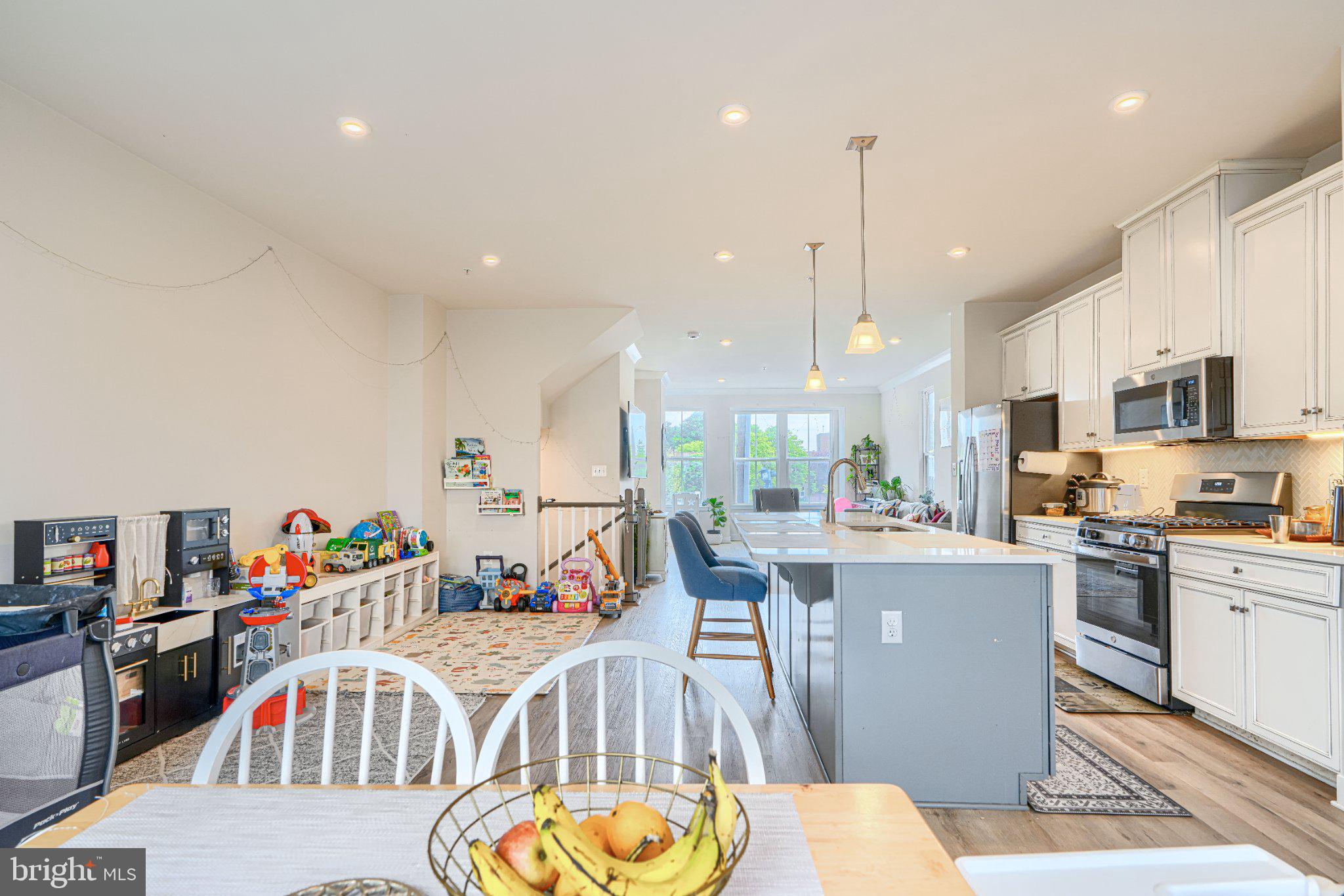1510 Decatur Street Baltimore, MD 21230 - Photo 9 of 27 a view of a dining room kitchen and furniture
