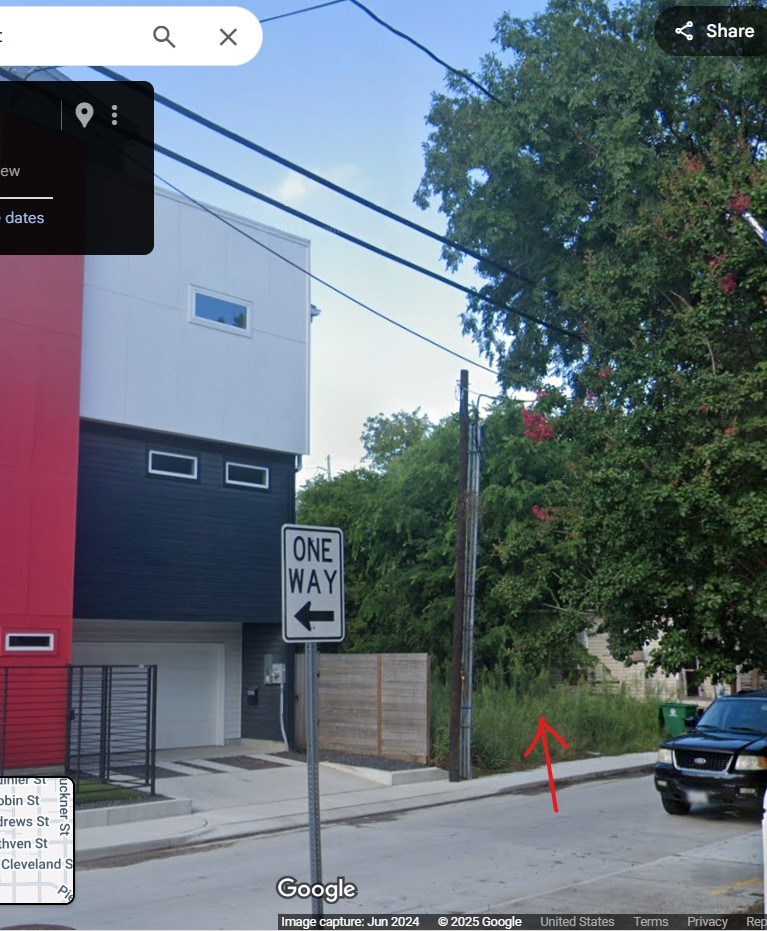 1511 Ruthven Street Houston, TX 77019 - Photo 3 of 5 a street sign on a pole on a street