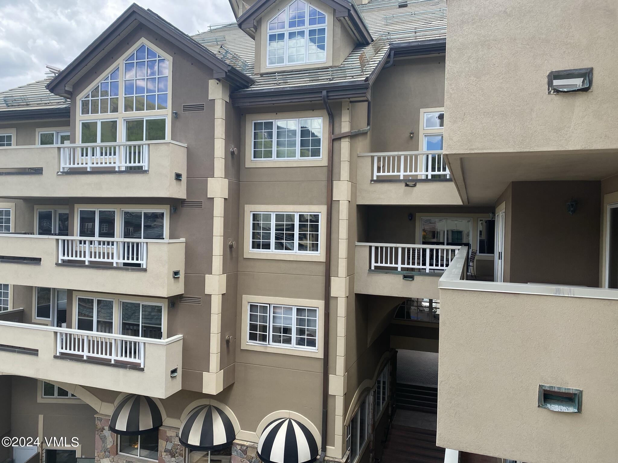 210 Offerson Road, Unit R217 WEEK 35 Beaver Creek, CO 81620 - Photo 4 of 26 a front view of a building with many windows