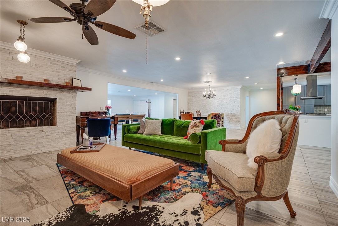 1321 South 7th Street Las Vegas, NV 89104 - Photo 11 of 47 Living room featuring a fireplace, ornamental mold
