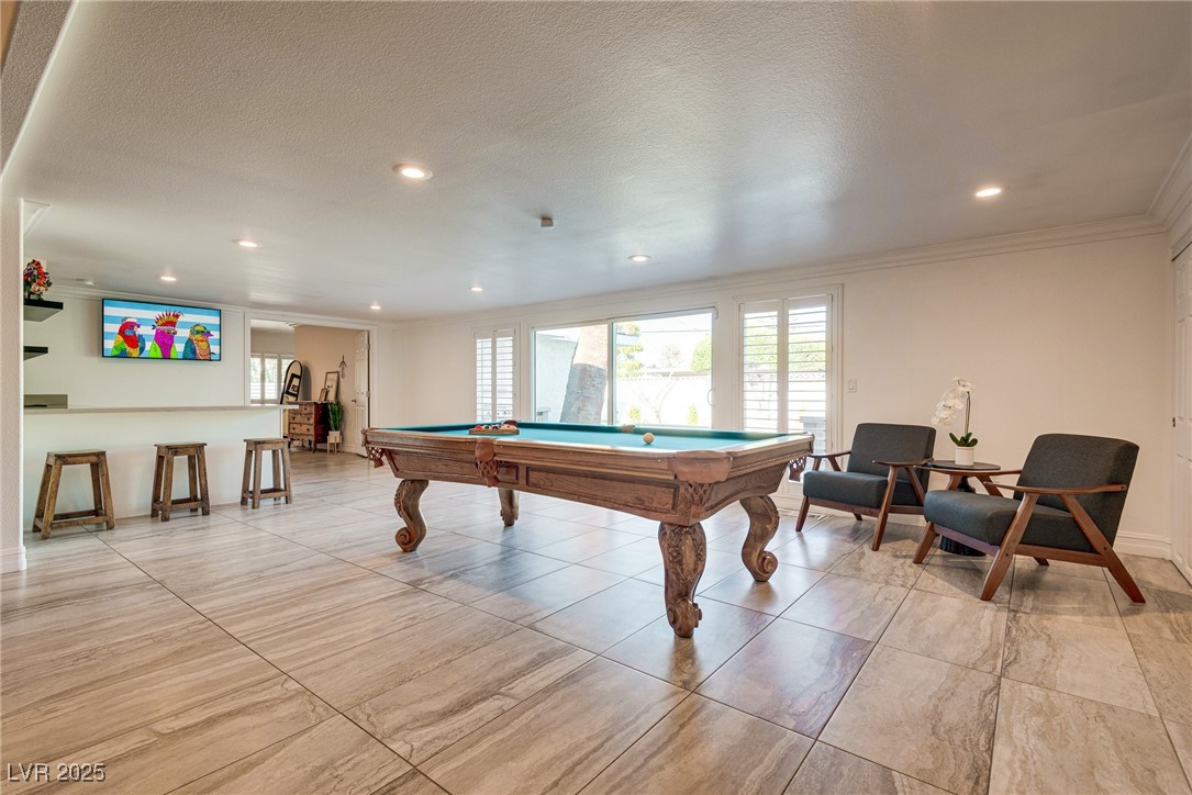 1321 South 7th Street Las Vegas, NV 89104 - Photo 19 of 47 Game room with ornamental molding, pool table, hea
