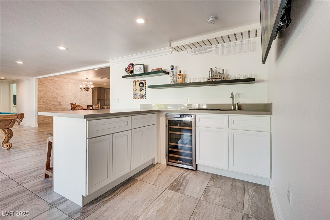 1321 South 7th Street Las Vegas, NV 89104 - Photo 20 of 47 Indoor wet bar with wine cooler, recessed lighting