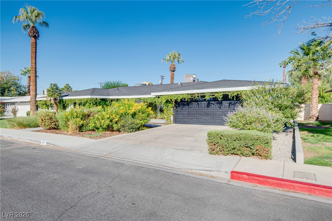 1321 South 7th Street Las Vegas, NV 89104 - Photo 2 of 47 View of front of property with driveway and a gara
