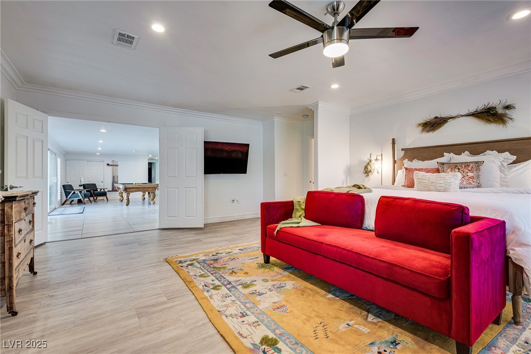 1321 South 7th Street Las Vegas, NV 89104 - Photo 23 of 47 Bedroom with ornamental molding, recessed lighting