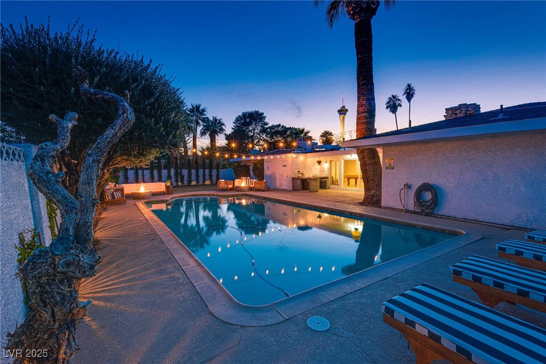 1321 South 7th Street Las Vegas, NV 89104 - Photo 3 of 47 Pool at dusk featuring a patio area