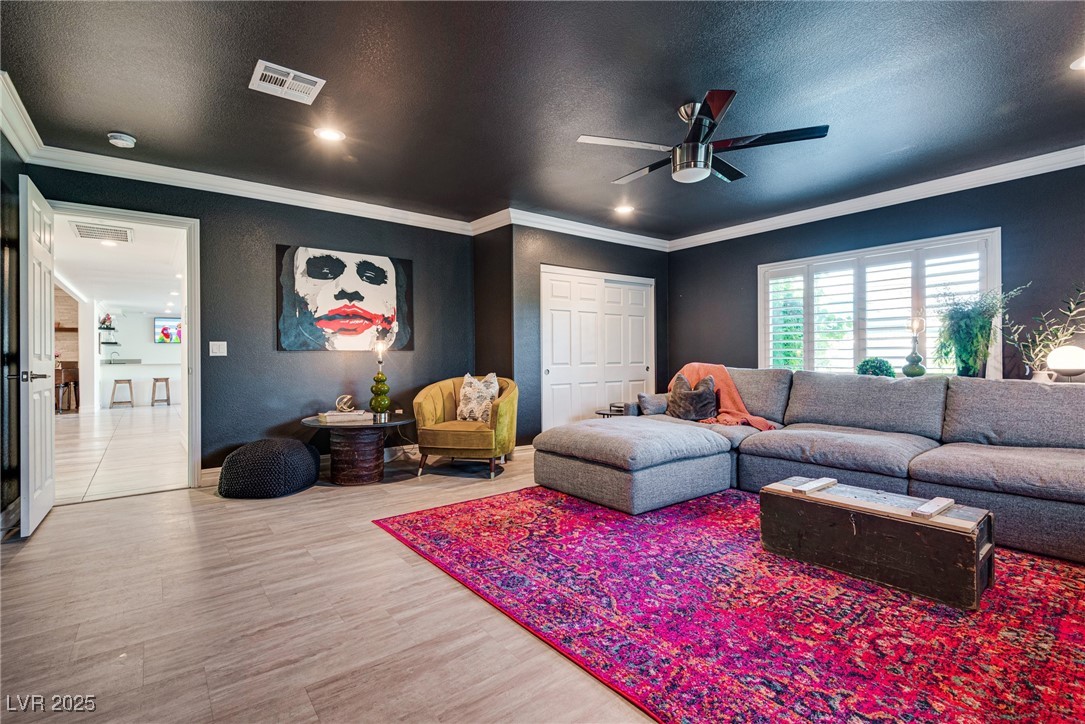 1321 South 7th Street Las Vegas, NV 89104 - Photo 44 of 47 Living room with ceiling fan, a textured ceiling,