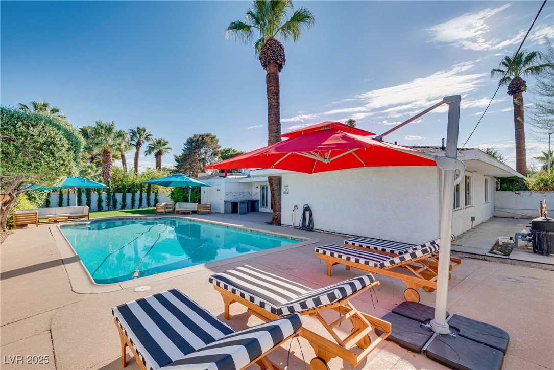 1321 South 7th Street Las Vegas, NV 89104 - Photo 6 of 47 View of swimming pool with a patio area and a fenc