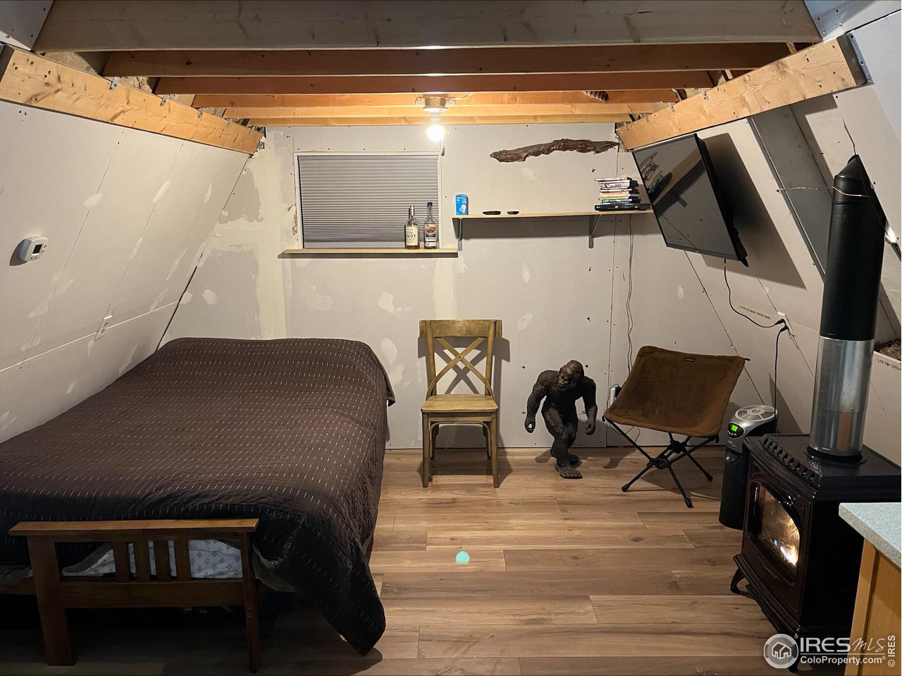 200 Hard Way Ward, CO 80481 - Photo 8 of 10 a view of living room with furniture and wooden floor