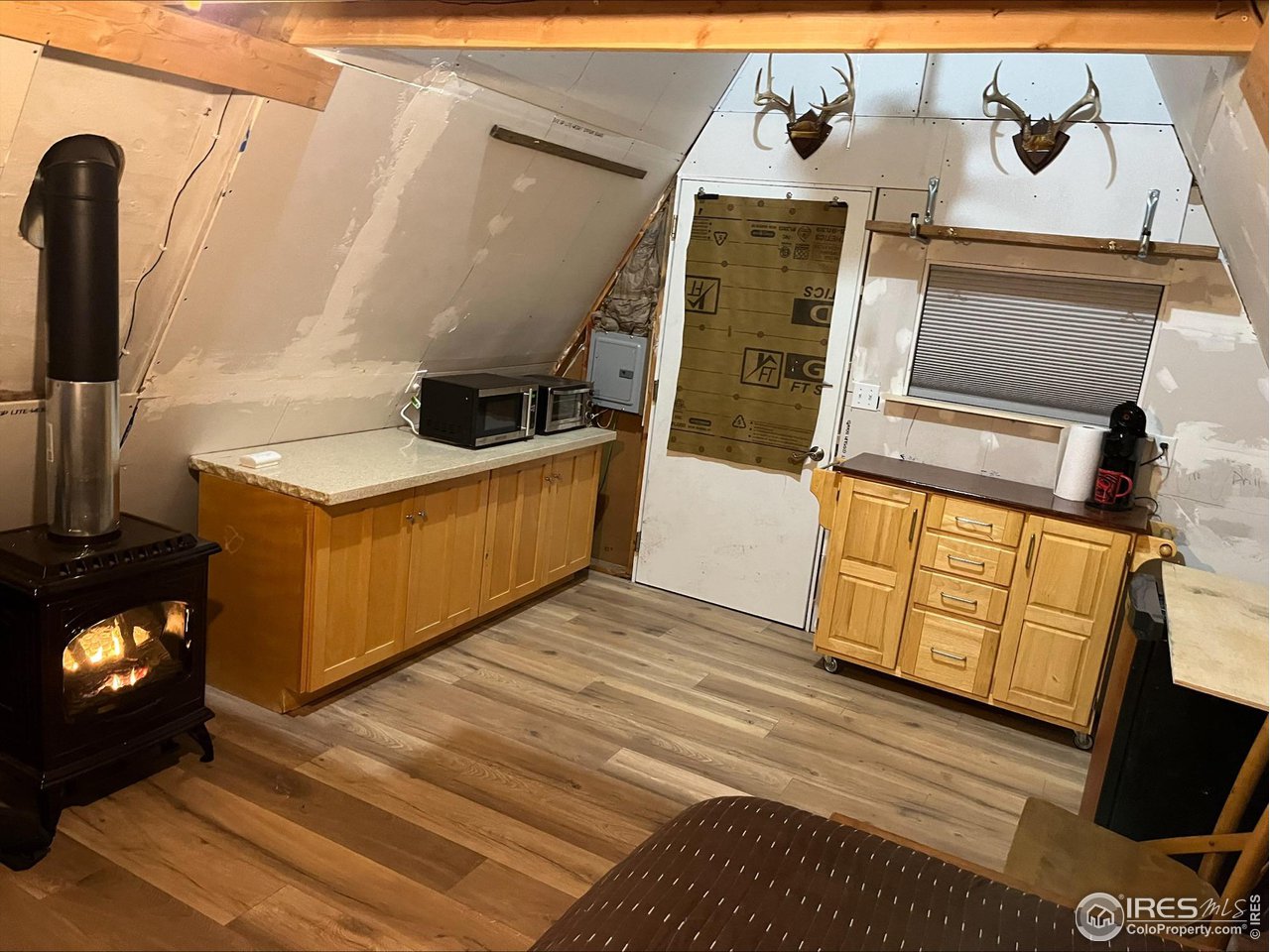 200 Hard Way Ward, CO 80481 - Photo 9 of 10 a view of living room with furniture and a fireplace