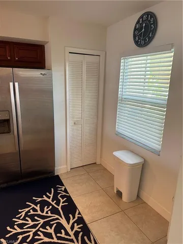 a kitchen with a sink stove and refrigerator