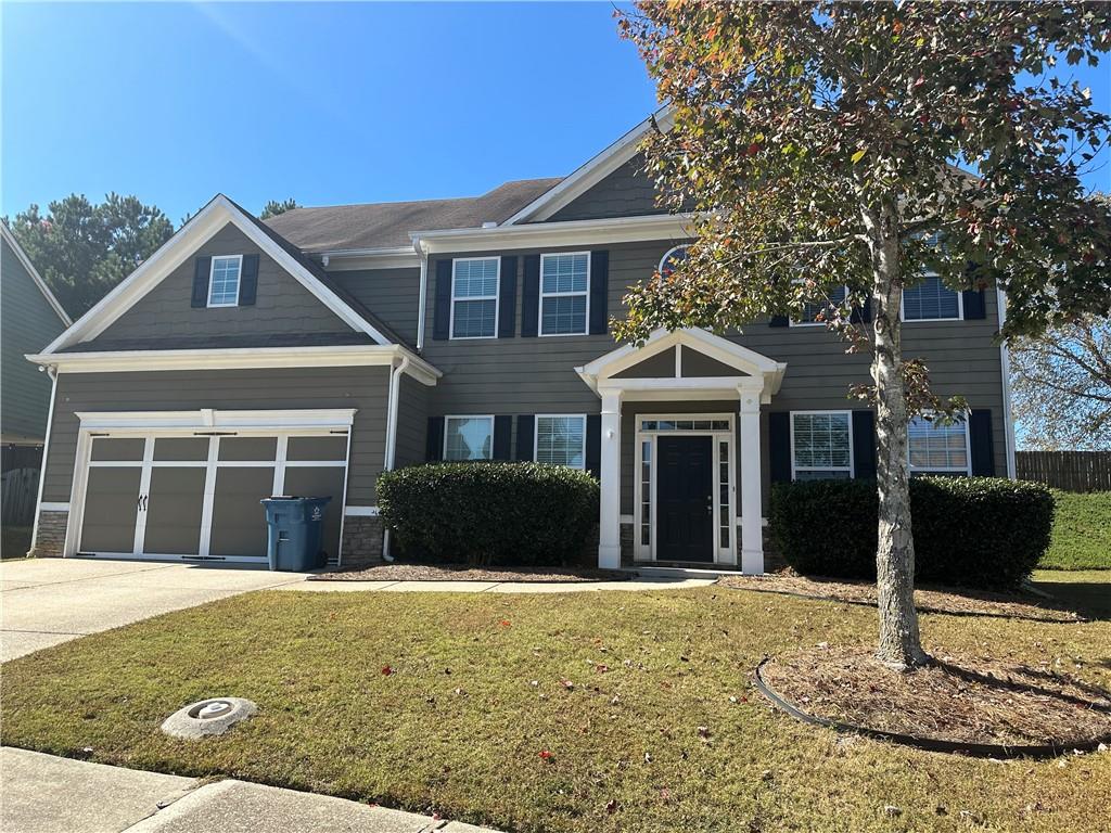 1402 Loowit Falls Way Braselton, GA 30517 - Photo 1 of 1 a front view of a house with a yard