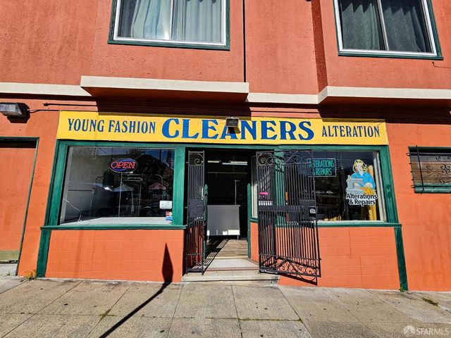 a view of a building with a street