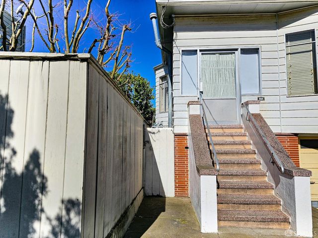 a view of a house with a staircase