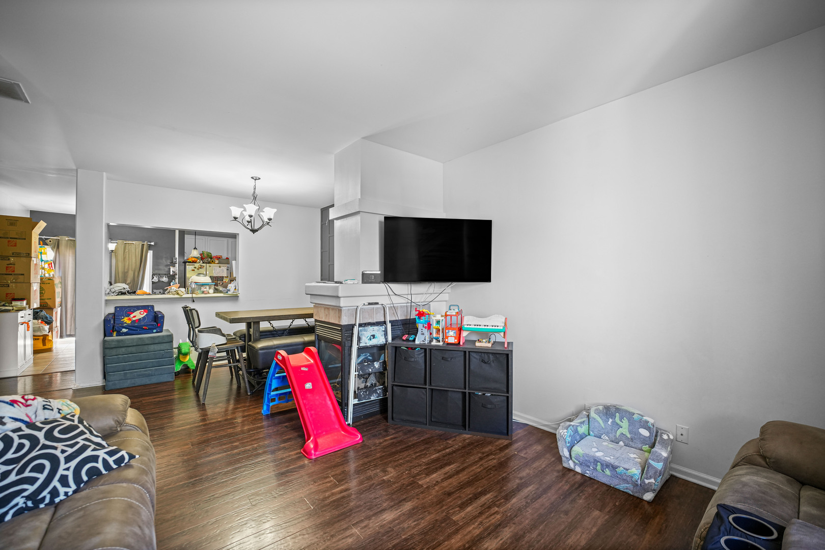 602 South Rosehall Lane Round Lake, IL 60073 - Photo 6 of 19 a living room with furniture and flat screen tv