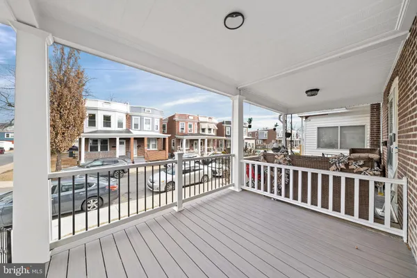 a view of a living room with wooden floor