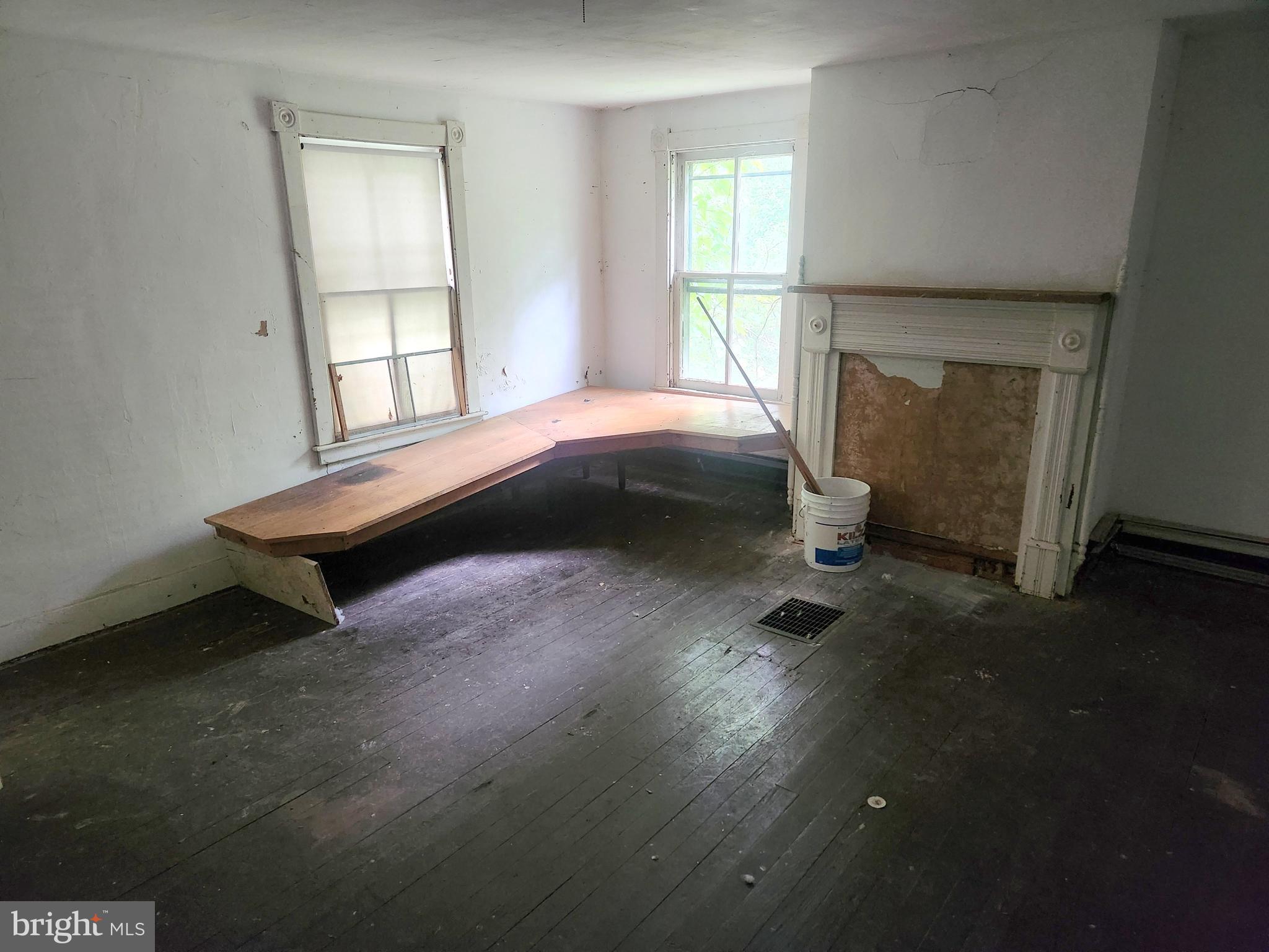 26506 Clarksburg Road Clarksburg, MD 20871 - Photo 30 of 39 a room with window and a table